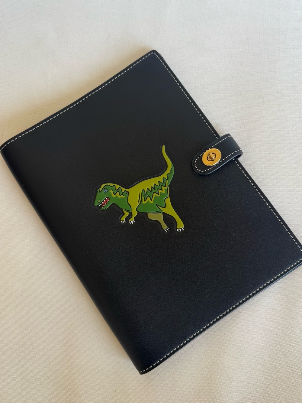 Coach rexy notebook